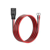 Coiled red and black wire cable with connectors on a white background